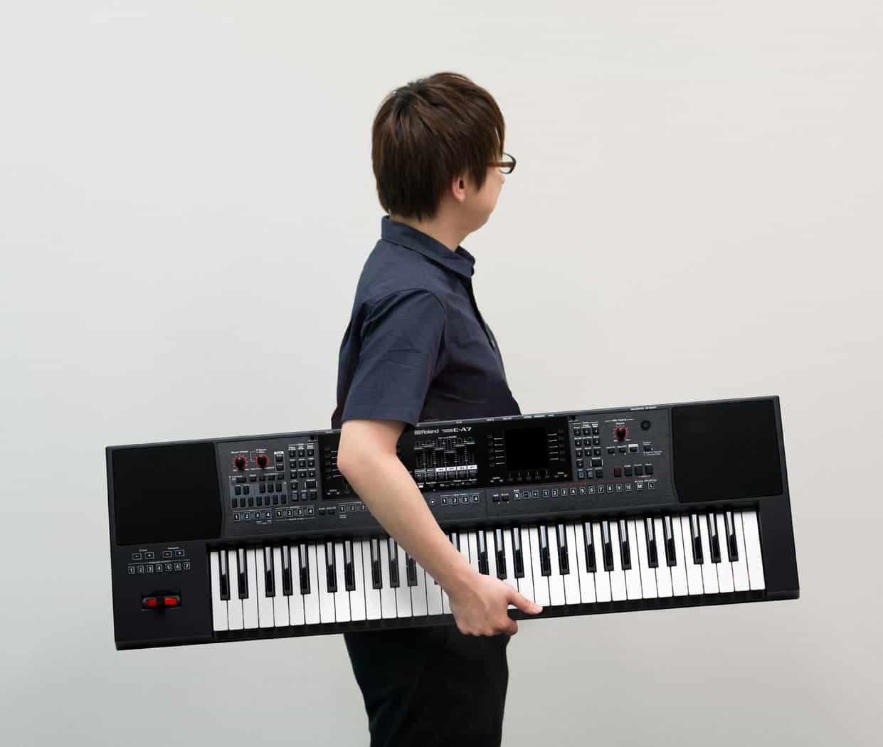 Roland E A7 61 key Expandable Arranger Keyboard boy